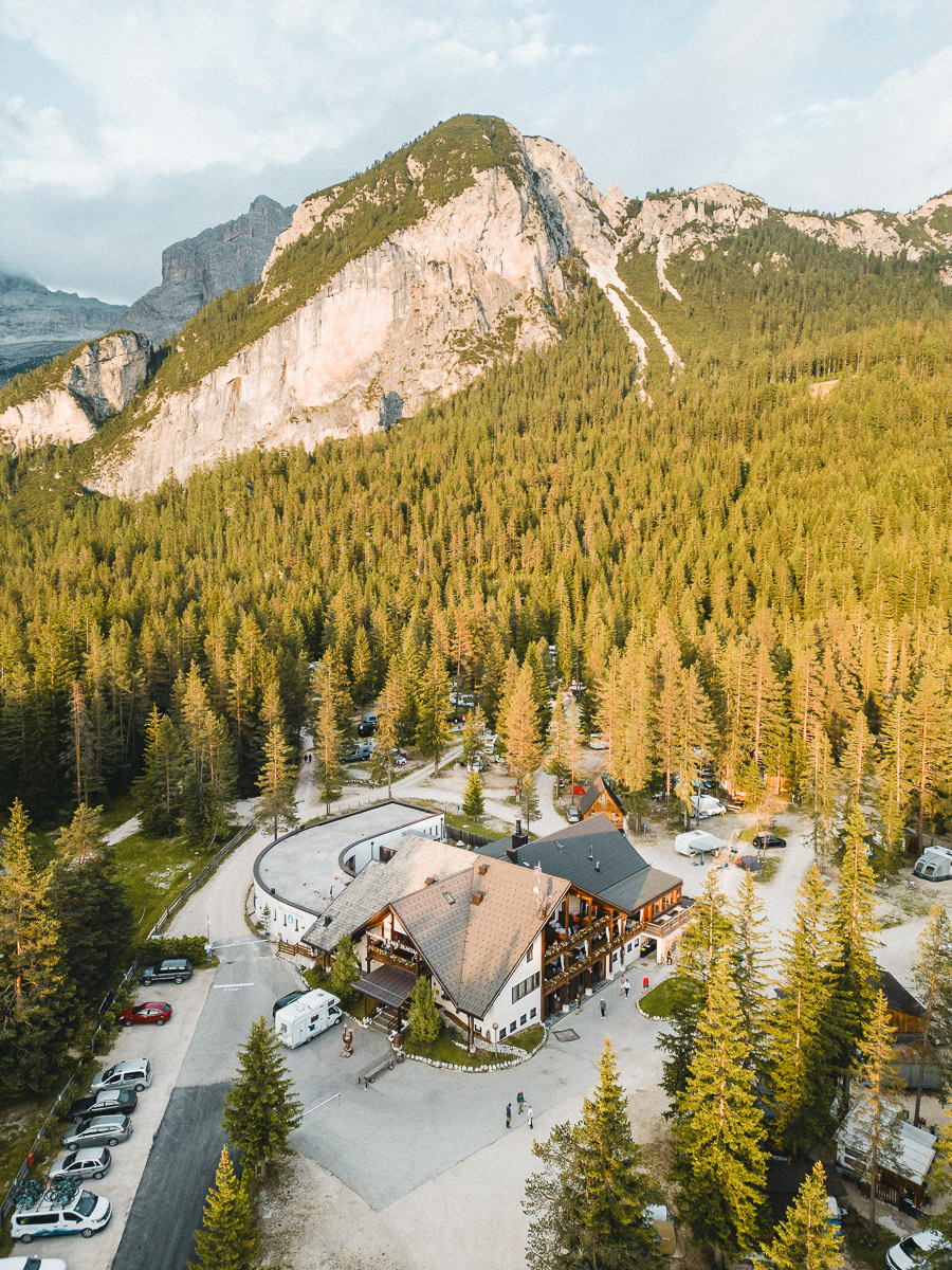 The reception and restaurant building below the peaks